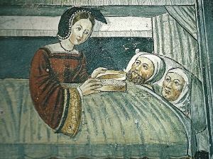 Assistenza ai malati in un antico dipinto