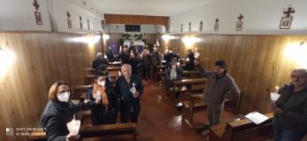 Foto con le candele nella preghiera di Sant'Egidio a Brozzi (Firenze)
